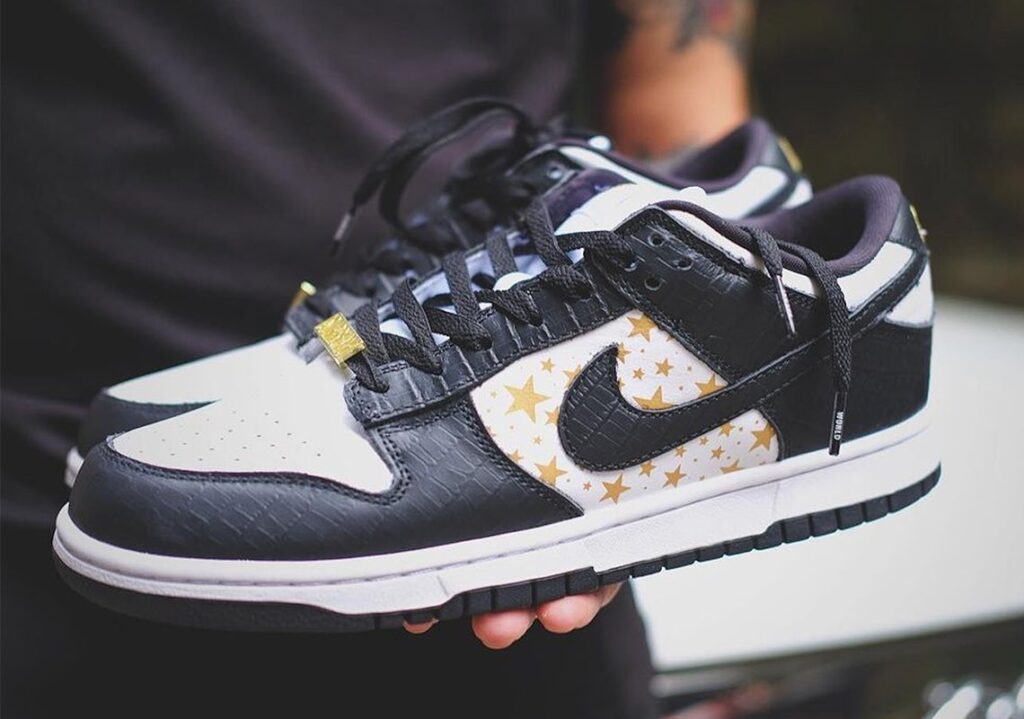 supreme-nike-sb-dunk-low-white-black-metallic-gold-DH3228-102-1