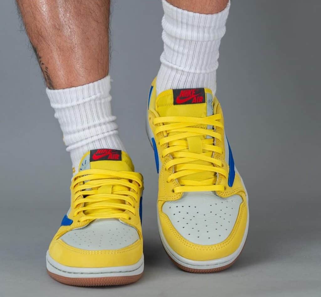 Travis-Scott-Air-Jordan-1-Low-OG-Canary-DZ4137-700-On-Feet-5