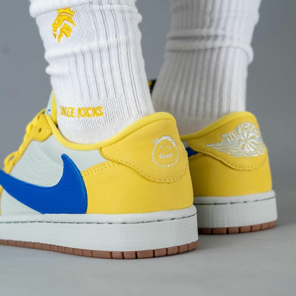 Travis-Scott-Air-Jordan-1-Low-OG-Canary-DZ4137-700-On-Feet-9